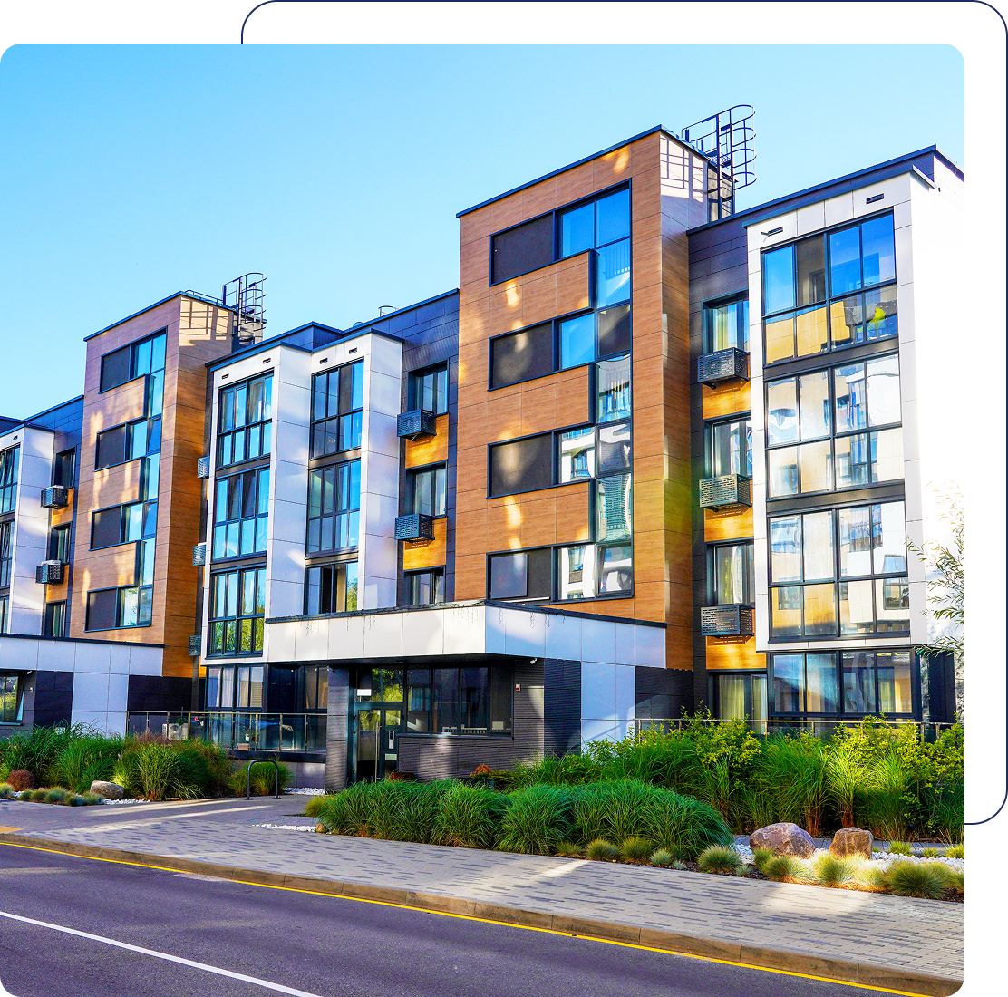 Modern apartment building with large windows.
